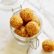No Bake Apricot Coconut Energy Bites in a glass jar