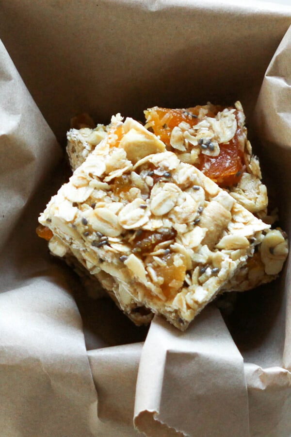 chewy apricot muesli bars stacked on top of each other