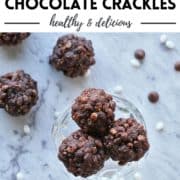 choc truffles piled on a plate with text overlay "healthy chocolate crackles".