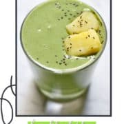 green smoothie in a glass with text overlay "kale pineapple smoothie".