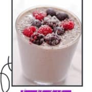 purple smoothie topped with berries with text overlay "mixed berry smoothie".