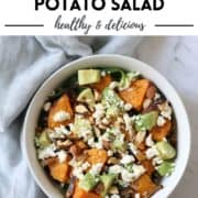 salad in a bowl with text overlay "roasted sweet potato salad".