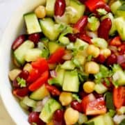 salad in a bowl with text overlay "chickpea & kidney bean salad".