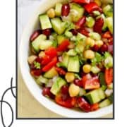 salad in a bowl with text overlay "middle eastern bean salad".