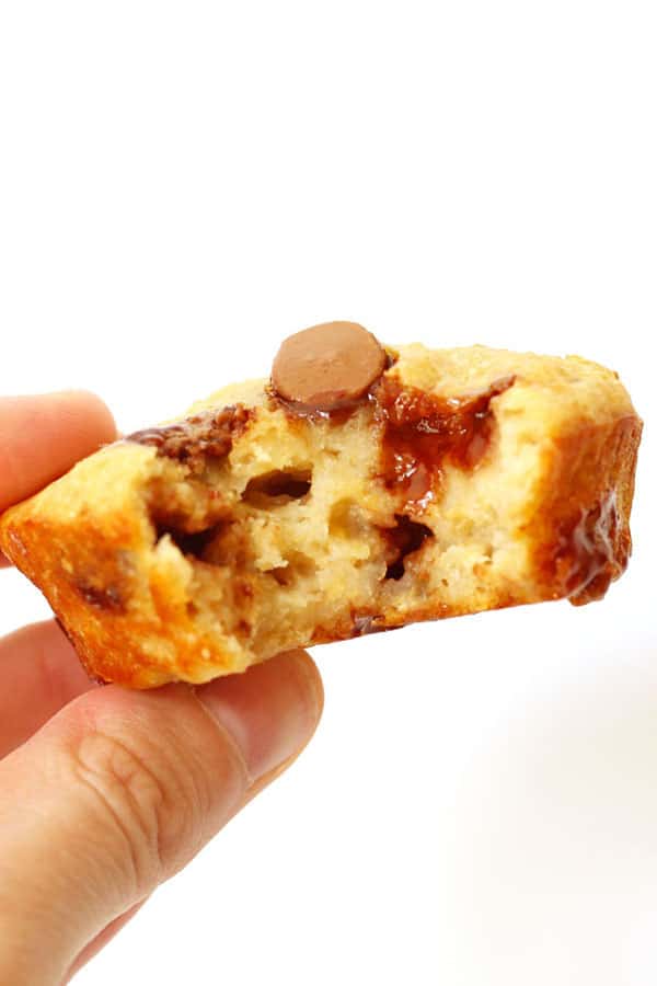 close up of a healthy banana chocolate chip muffin with a bite removed