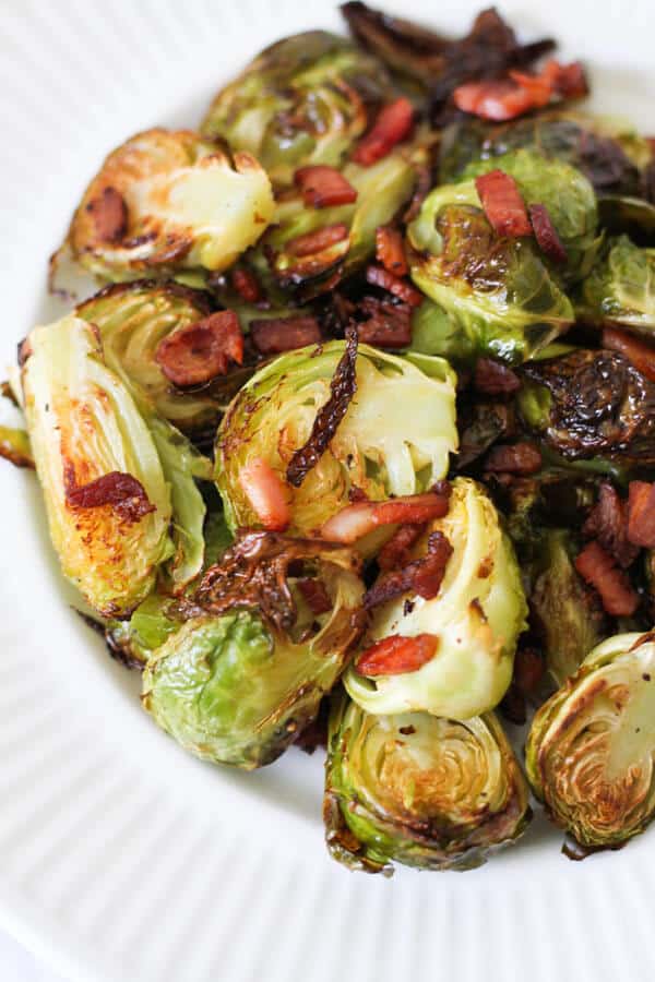 a close up image of roasted brussels sprouts