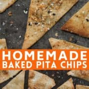 pita chips on a baking tray with text overlay "homemade baked pita chips".