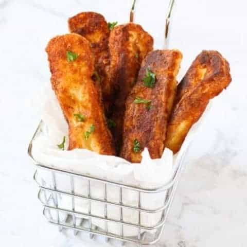 halloumi fries in a wire basket.