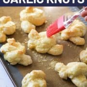 garlic knots on a baking tray.