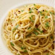 Spaghetti with Garlic & Oil on a white plate.