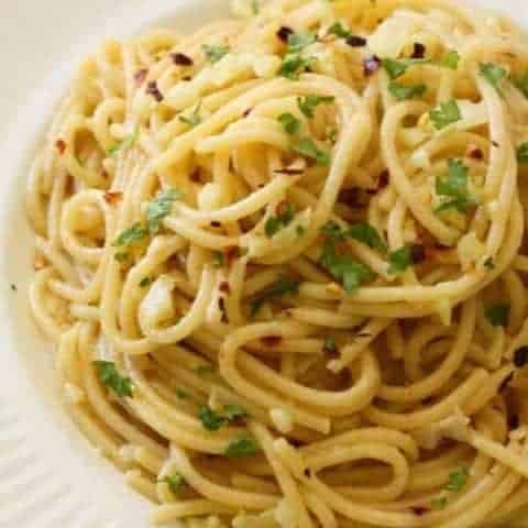 Spaghetti with Garlic and Oil on a white plate