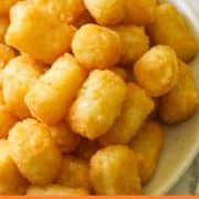 A plate of tater tots with text overlay "Air Fryer Tater Tots".