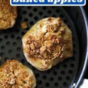 apples in an air fryer basket with text overlay "air fryer baked apples".