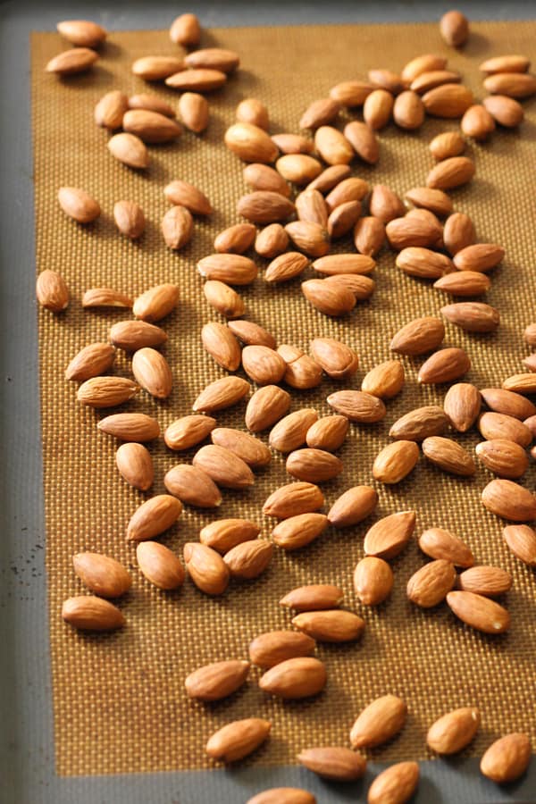 plain almonds on a baking tray.