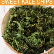 sweet and salty kale chips in a white bowl.
