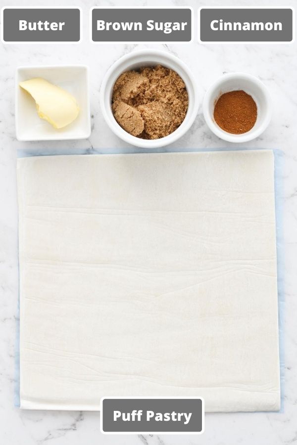 ingredients on a white marble background.