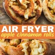 air fryer apple cinnamon rolls on a wooden cutting board.