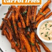 fries on a white plate with text overlay "air fryer carrot fries".
