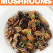 mushrooms on a white plate with text overlay "air fryer mushrooms".