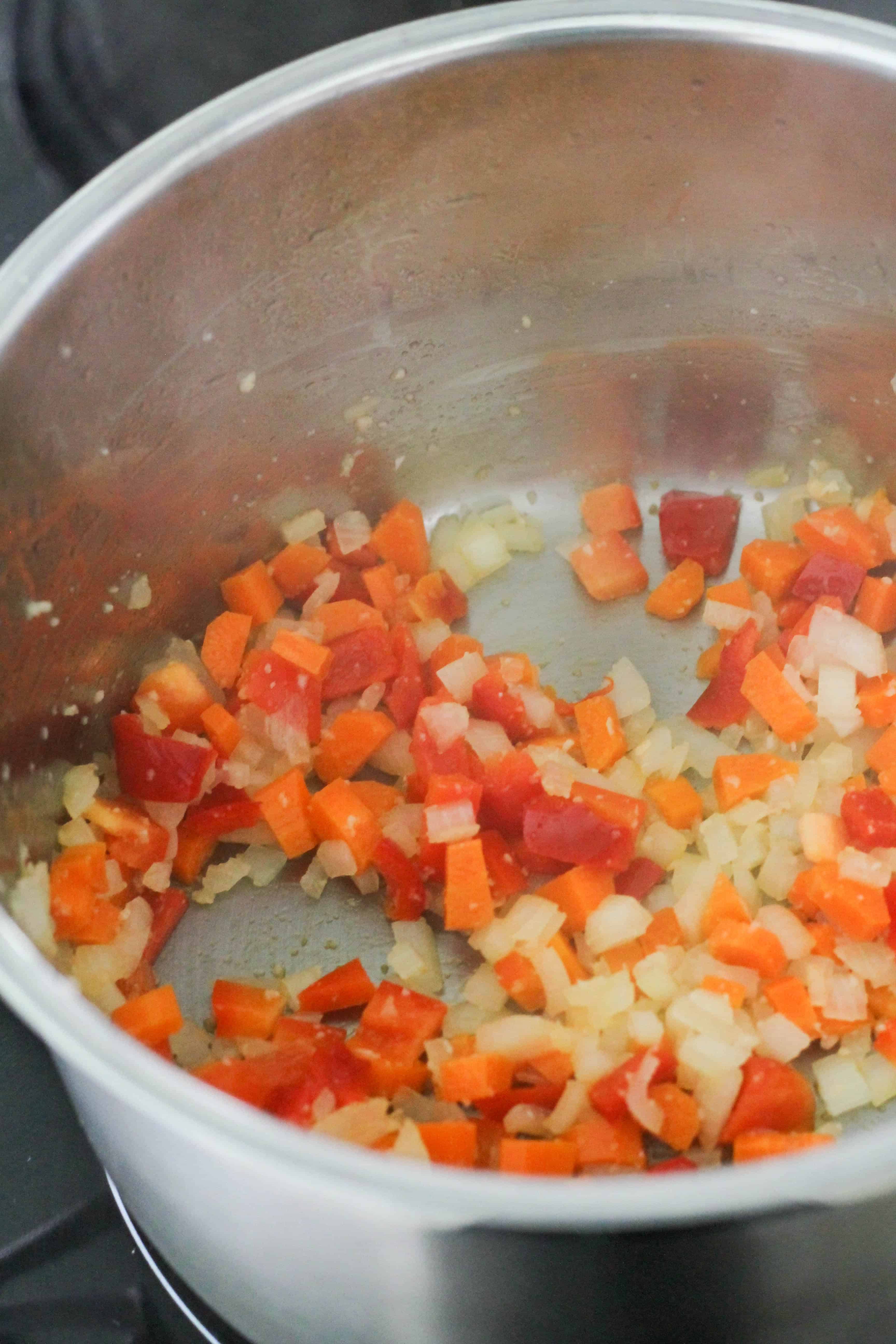 diced veggies in a saucepan.