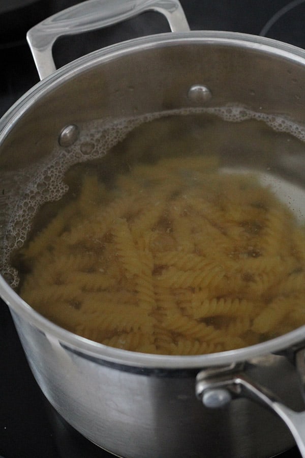 pasta in a saucepan of water.