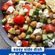 salad in a blue bowl with text overlay "chickpea, avocado & feta salad".