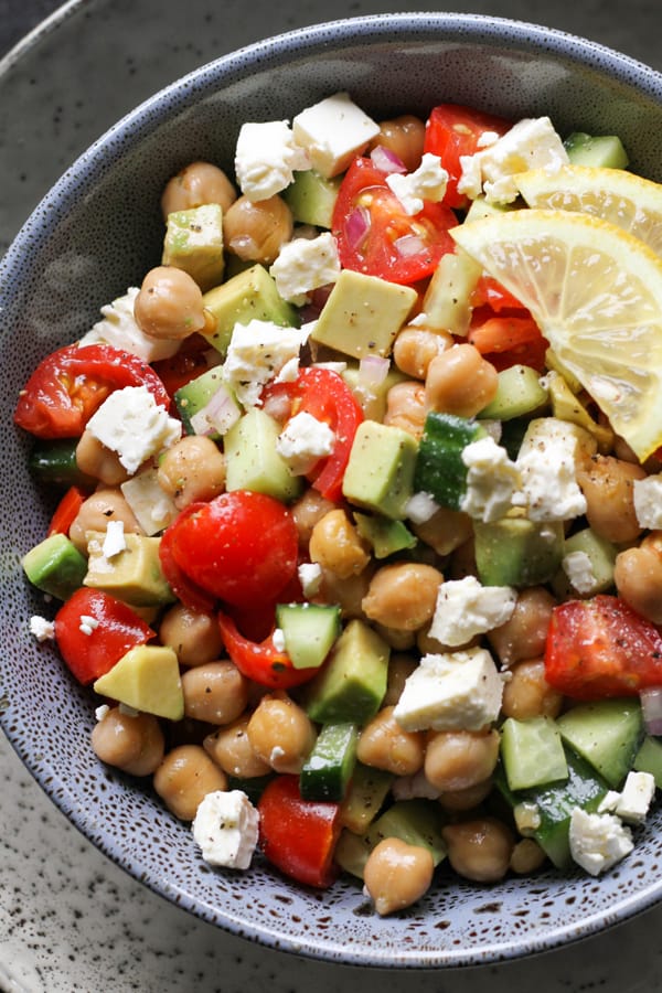 chickpea salad in a blue bowl.