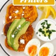 two pumpkin fritters on a white plate topped with feta and parsley with text overlay "pumpkin fritters".