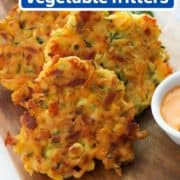 fritters on a wooden board with text overlay "quick & easy vegetable fritters".