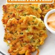fritters on a white plate with text overlay "meatless monday veggie fritters".