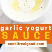 sauce in a white bowl with text overlay "garlic yogurt sauce".