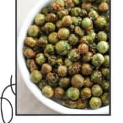 roasted peas in a white bowl with text overlay "roasted crispy peas".