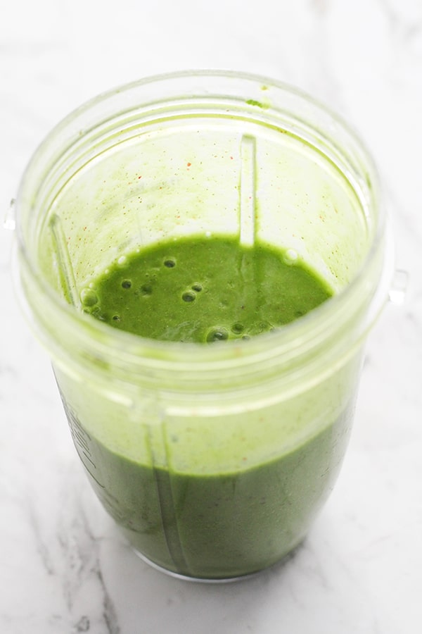 green smoothie in a blender.