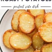 potatoes on a white plate with text overlay "salt & vinegar roast potatoes".