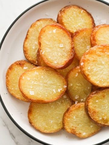 salt and vinegar potatoes on a white plate.