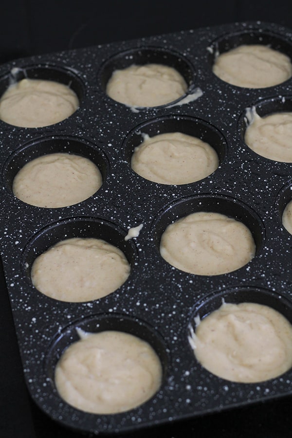 muffin mixture in a muffin pan.