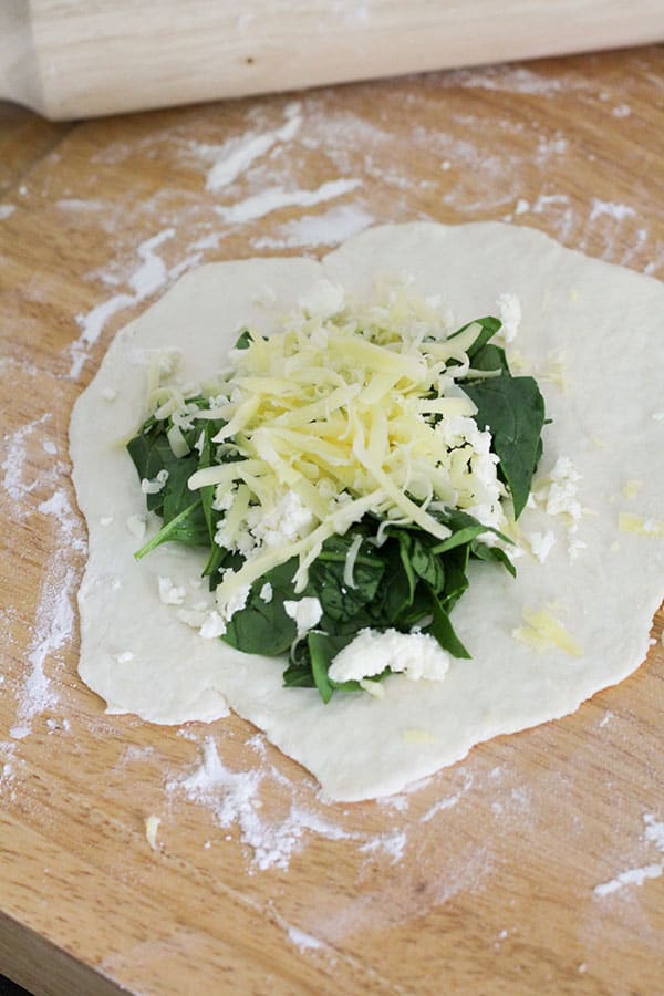 dough filled with spinach, feta and cheddar cheese.