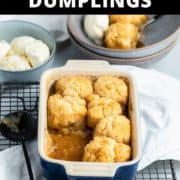 dumplings in a baking dish with text overlay "golden syrup dumplings".