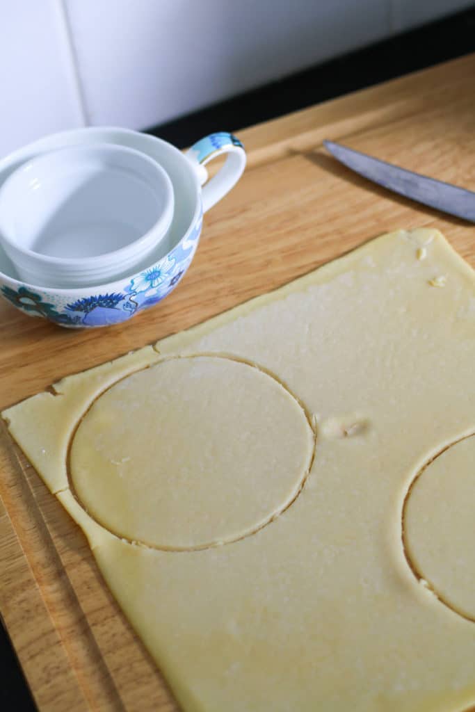 circles cut out of a sheet of shortcrust pastry.