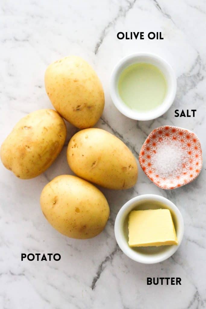 ingredients for air fryer smashed potatoes including butter, oil, salt and potatoes.